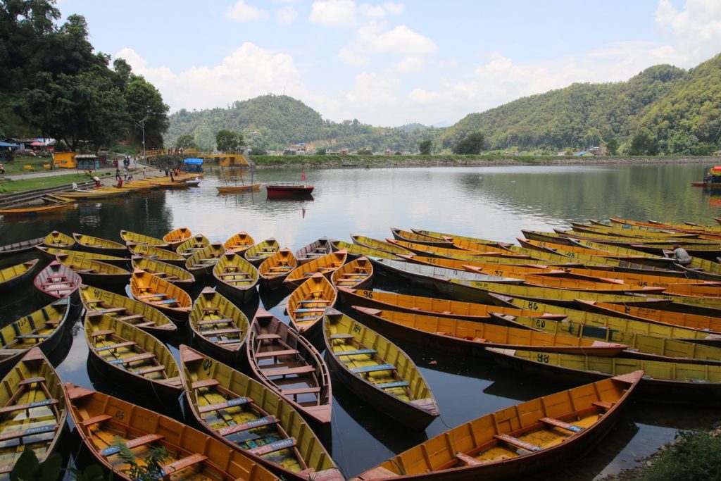 Colorful Boats on Begnas Lake, Pokhara, Nepal – photograph